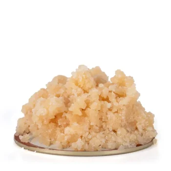 Hawaiian Pink Punch live resin with a shimmering, crystalline structure