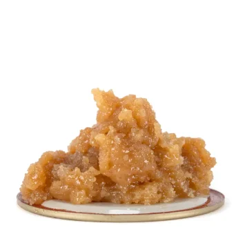 orange creamsicle live resin showcasing its sticky quality