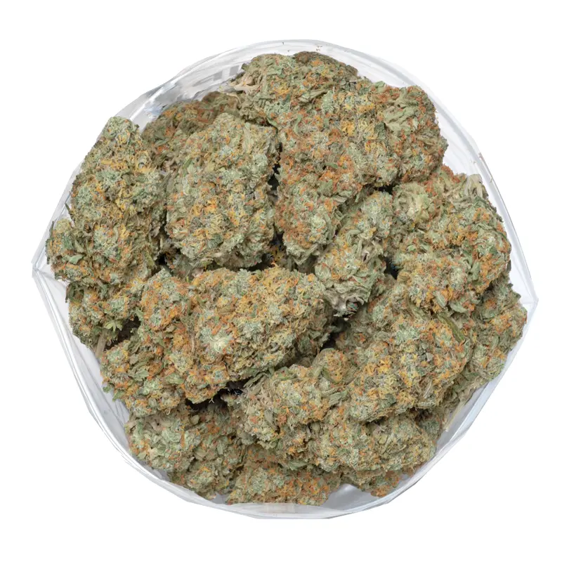 strawberry-romulan marijuana buds top view displaying beautiful pistils and shiny trichomes